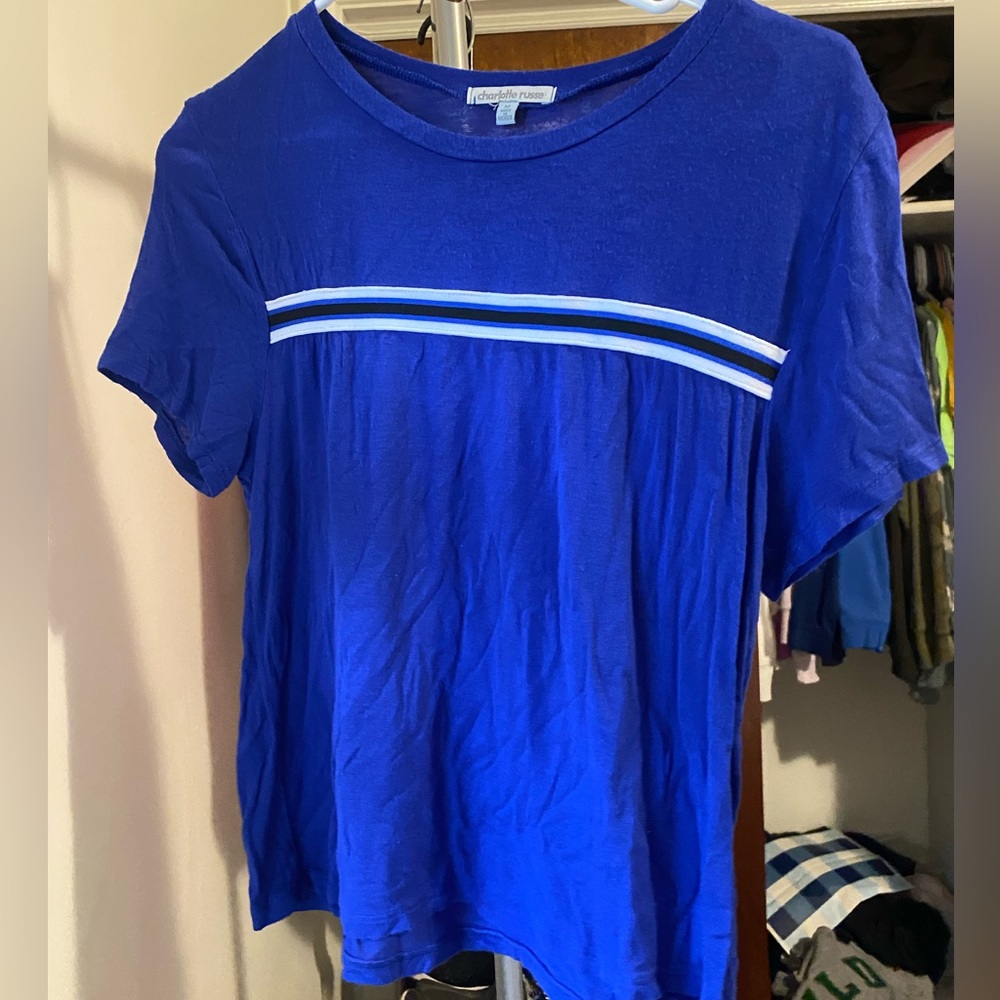 Blue shirts with black and white stripe